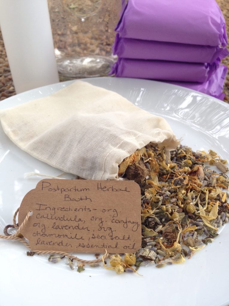 A postpartum herbal bath is a relaxing way to heal, soothe and restore oneself after the challenges of childbirth. Follow this recipe to make a herbal bath, padsicles or a postpartum herbal peri bottle.