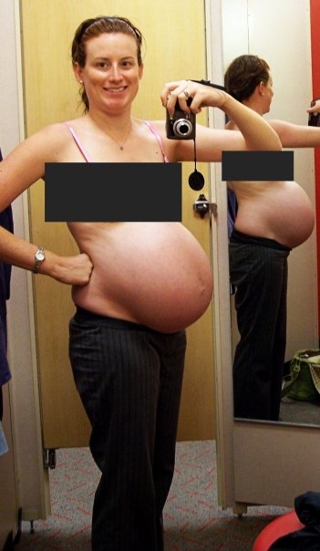 Belly photo of woman in Target dressing room journaling at 37 weeks pregnant about things about pregnancy that shocked me