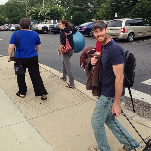 Important questions to ask a midwife are how she would handle a transfer to a hospital. Here is a photo of a midwife, student midwife, dad, and pregnant mother transferring from homebirth to hospital birth to get some pitocin induction after water broke