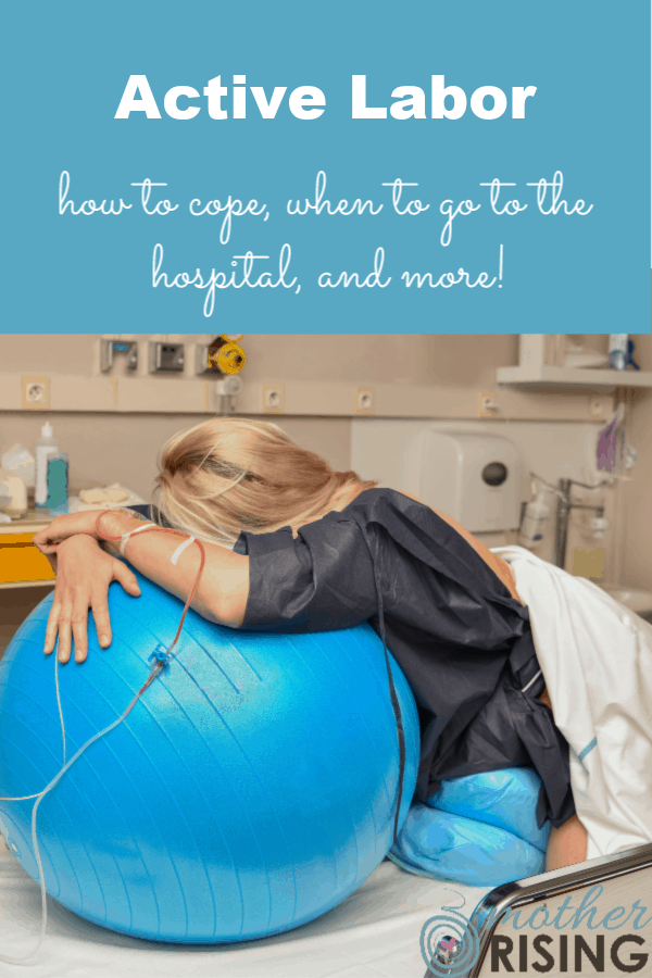 Woman leaning on ball in hospital while coping with active labor.