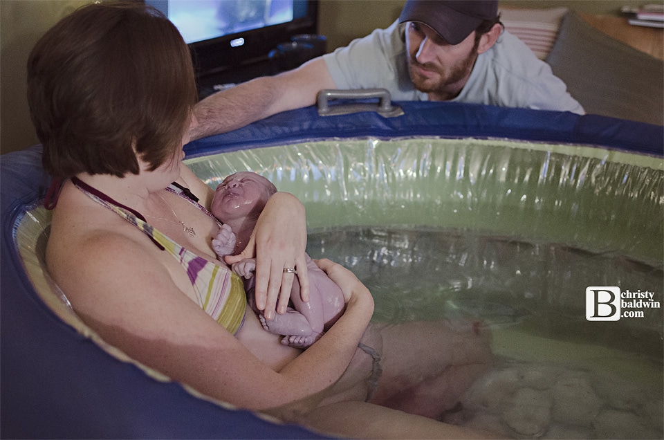 A water birth is helpful for pain coping, relaxation and easier birthing. It has even been called a natural epidural! In this post we will cover all things water birth - the benefits, warnings, tips and tricks.