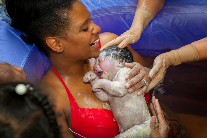 A water birth is helpful for pain coping, relaxation and easier birthing. It has even been called a natural epidural! In this post we will cover all things water birth - the benefits, warnings, tips and tricks.