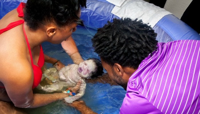 A water birth is helpful for pain coping, relaxation and easier birthing. It has even been called a natural epidural! In this post we will cover all things water birth - the benefits, warnings, tips and tricks.