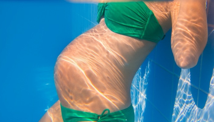 A summer pregnancy tip is to go to the pool - it's refreshing, fun, takes the weight of the pregnancy off the body, and helps baby to get in a good position for labor!