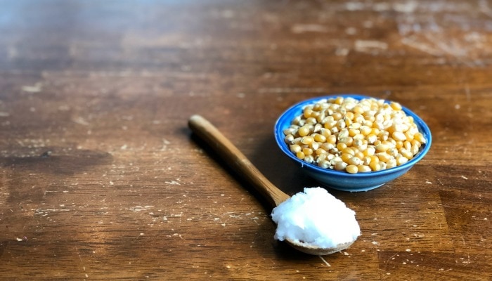 By using my step-by-step instructions you will have perfectly popped coconut oil popcorn made on the stove with minimal (if not zero!) unpopped kernels.  Life goals, people!  Let's get started.