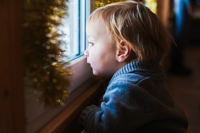 Wherever you're at - mom of a tiny newborn, crawler, or mini-toddler - in this article you'll find practical tips for navigating baby's first Christmas. #christmas #newborn #postpartumtips #babysfirstchristmas #firstchristmas