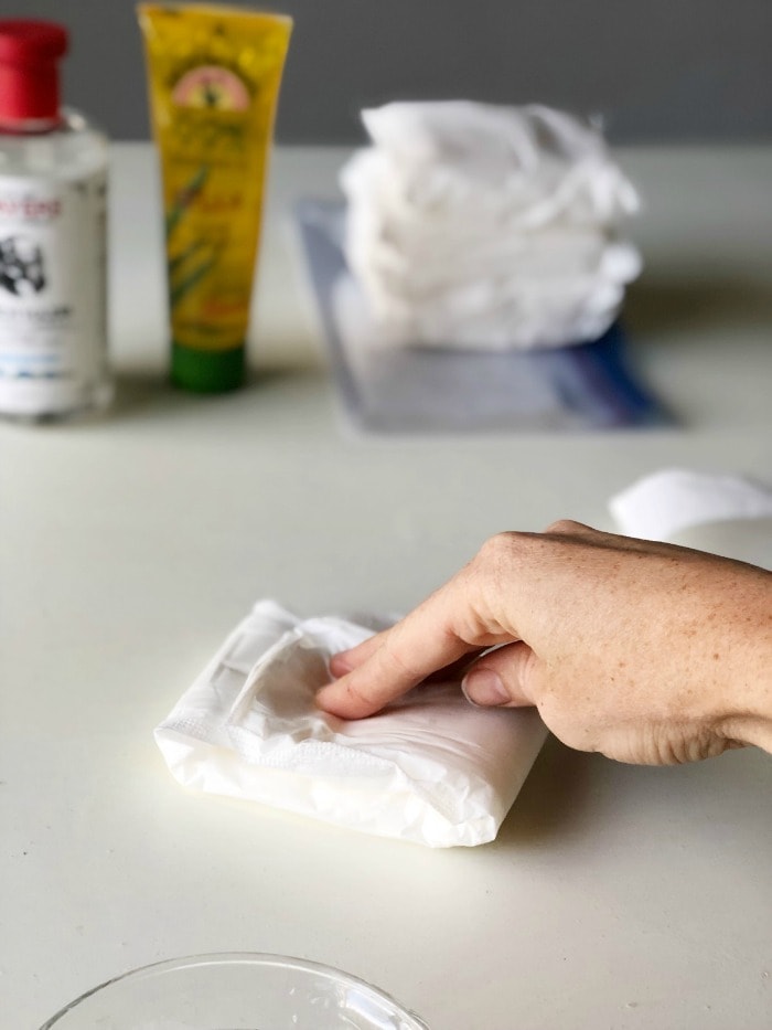 Padsicles are frozen postpartum pads soaked with healing ingredients that are used for pain relief and to promote healing after childbirth. DIY step by step instructions to make these healing pads in the third trimester. #postpartum #diy #pregnancy #thirdtrimester #essentialoils
