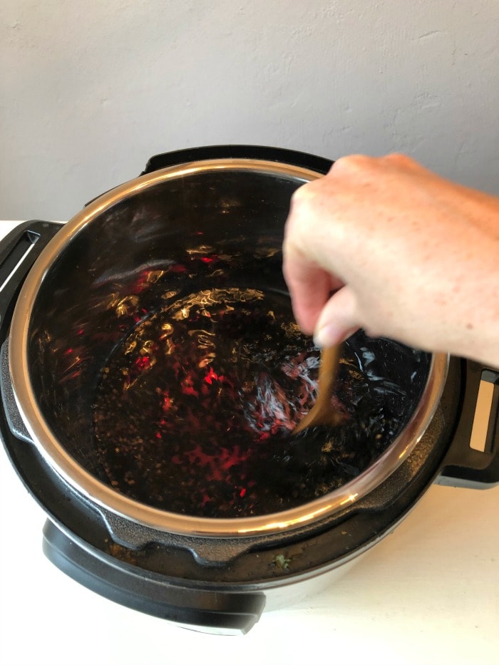 Taken daily elderberry syrup boosts the immune system and can shorten illnesses. Use these instructions to make instant pot elderberry syrup. It's so easy!