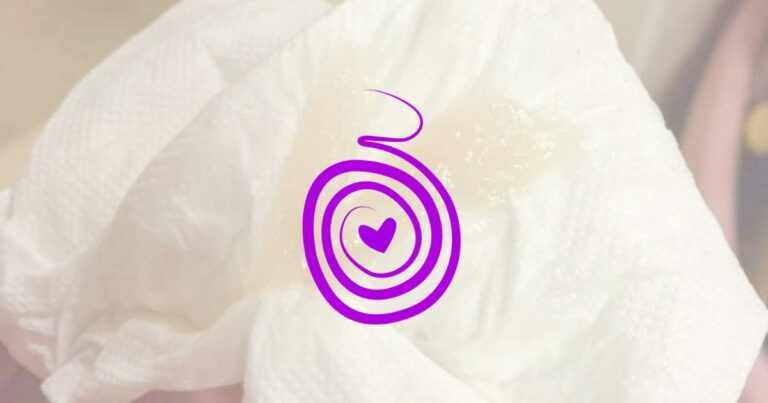 image of light colored mucus plug on white toilet paper