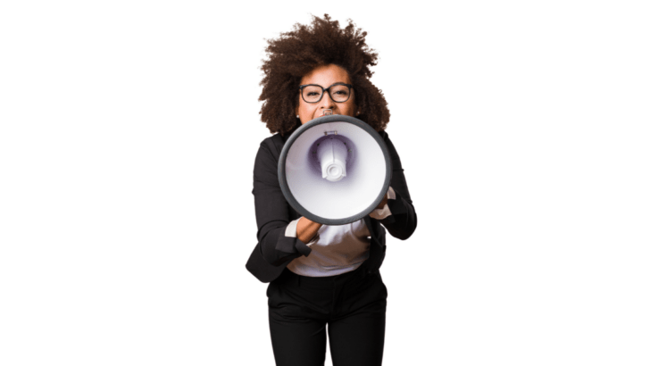woman in black clothes and big hair yelling into a white megaphone