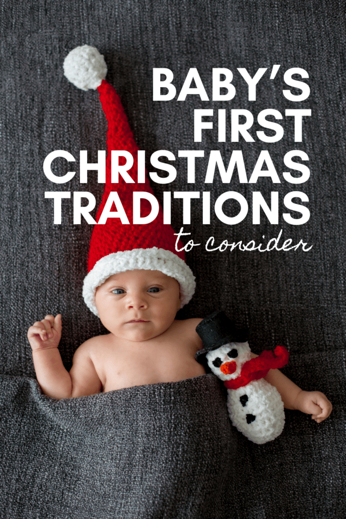 posing a baby for photos for baby's first Christmas with red and white knitted pointed Christmas hat on holding a knitted snowman