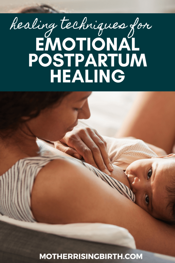 woman with dark hair in bed breastfeeding baby thinking about emotional postpartum healing